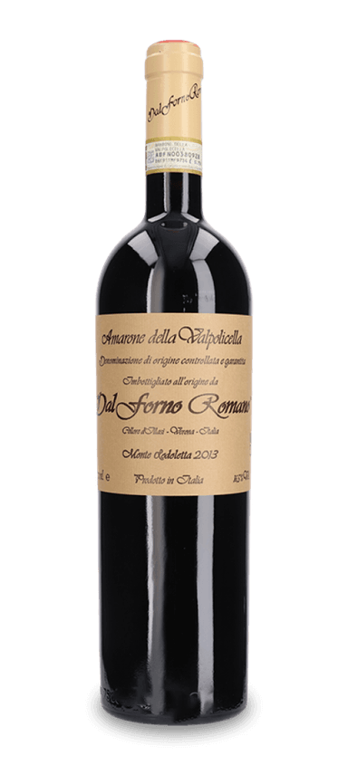 The Dal Forno Romano estate is planted with 65 acres of classic Amarone grape varieties (corvina, corvinone, and rondinella, among others). Often lauded as one of Italy’s top Amarone producers, Dal Forno takes advantage of the vineyard’s aspect and elevation to retain acidity in the grapes, and therefore the final wine despite the intense grape drying process.
The 2013 Dal Forno Romano Vigneto Monte Lodoletta is a force to be reckoned with – the aromatics leap out of the glass, and the wine itself is full-bodied, deeply colored, and brimming with flavor. Dark fruit notes are contrasted against mushroom, leather, and spice, while a silky mouthfeel, firm but elegant tannins, and bright acidity on the finish round out the structure. “Absurdly intense on the nose, saturated in dark-plum essence, vanilla, tar, ash, mocha, and light raisins,” wrote critic James Suckling, who awarded the vintage 97 points. He continued, “Somehow, this still manages to be fresh and elegant.”
The Final Sip: The 2013 Dal Forno Romano Vigneto Monte Lodoletta can absolutely be enjoyed now (perhaps with a bit of chocolate in place of a more traditional dessert), but it will only continue to improve in the bottle over the next decade.